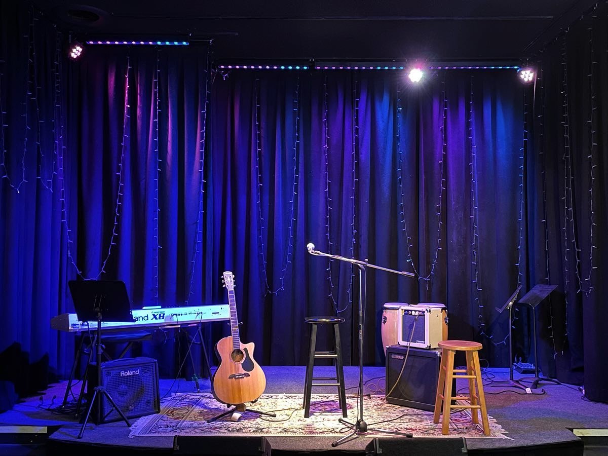 ViSTA Theater stage with blue curtains